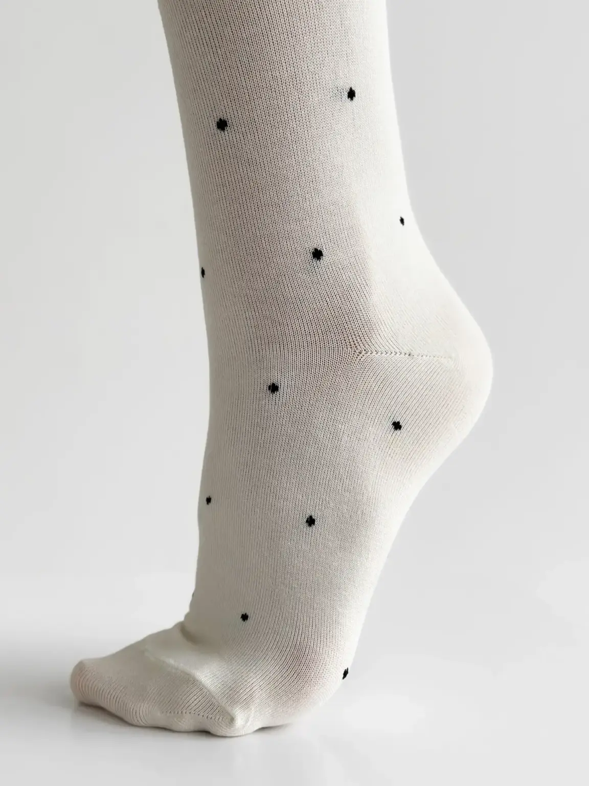 Колготи трикотажні чорний горох на білому