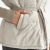 Жилетка стьобана дута з поясом кремова