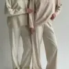 Светр вʼязаний молочний у блакитну квітку "onesize"