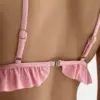 Купальник з рюшами рожевий